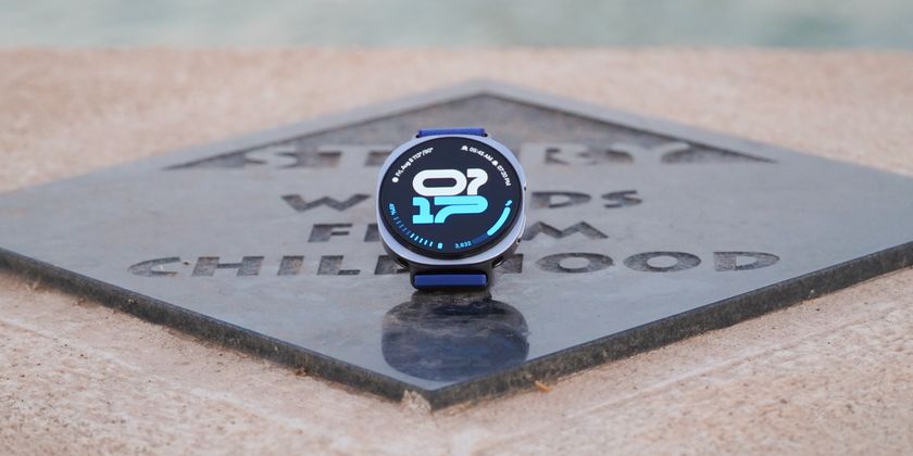 The Samsung Galaxy Watch 8 showing an athletic watch face on a plaque.