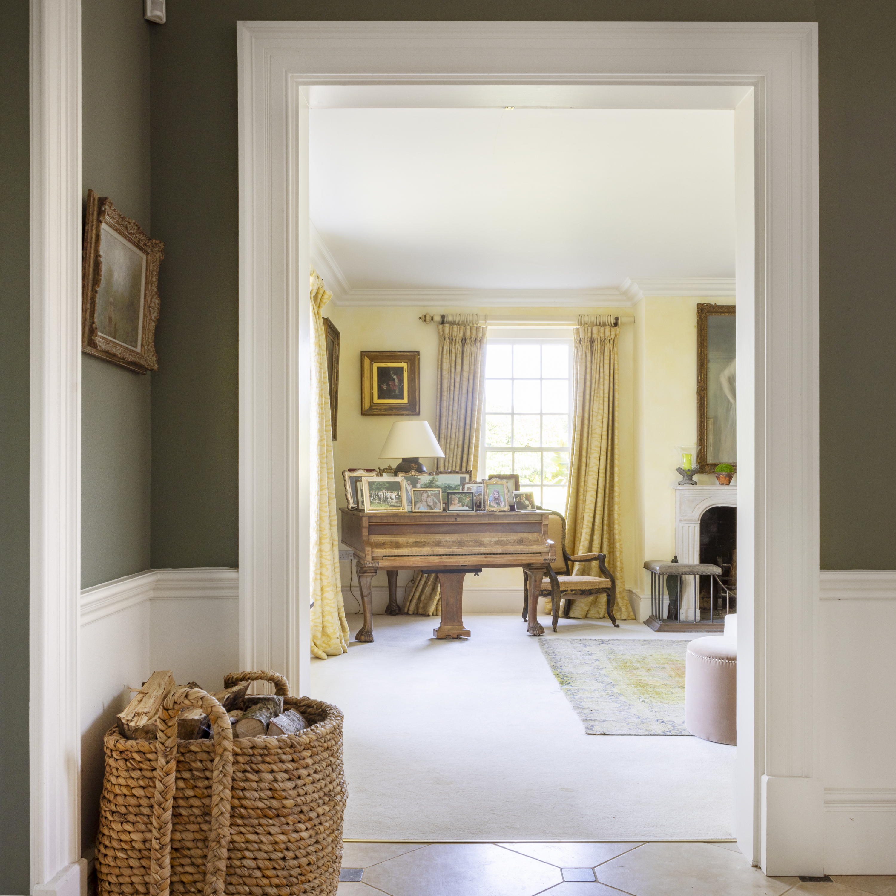 Inside Mount Farm, a basket of wood and grand piano