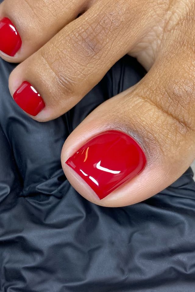@bombshellnailslondon red pedicure designs