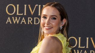 Rose Ayling-Ellis attends The Olivier Awards 2023 at the Royal Albert Hall in a yellow ball gown