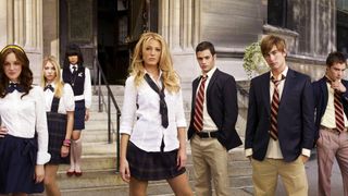(L to R) Leighton Meester as Blair, Blake Lively as Serena, Penn Badgley as Dan, Chace Crawford as Nate and Ed Westwick as Chuck standing outside in art for Gossip Girl