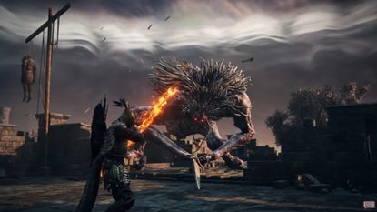 the ironeye archer class weilding a flaming bow against a big ogre