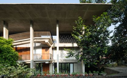 house exterior with overhanging concrete roof