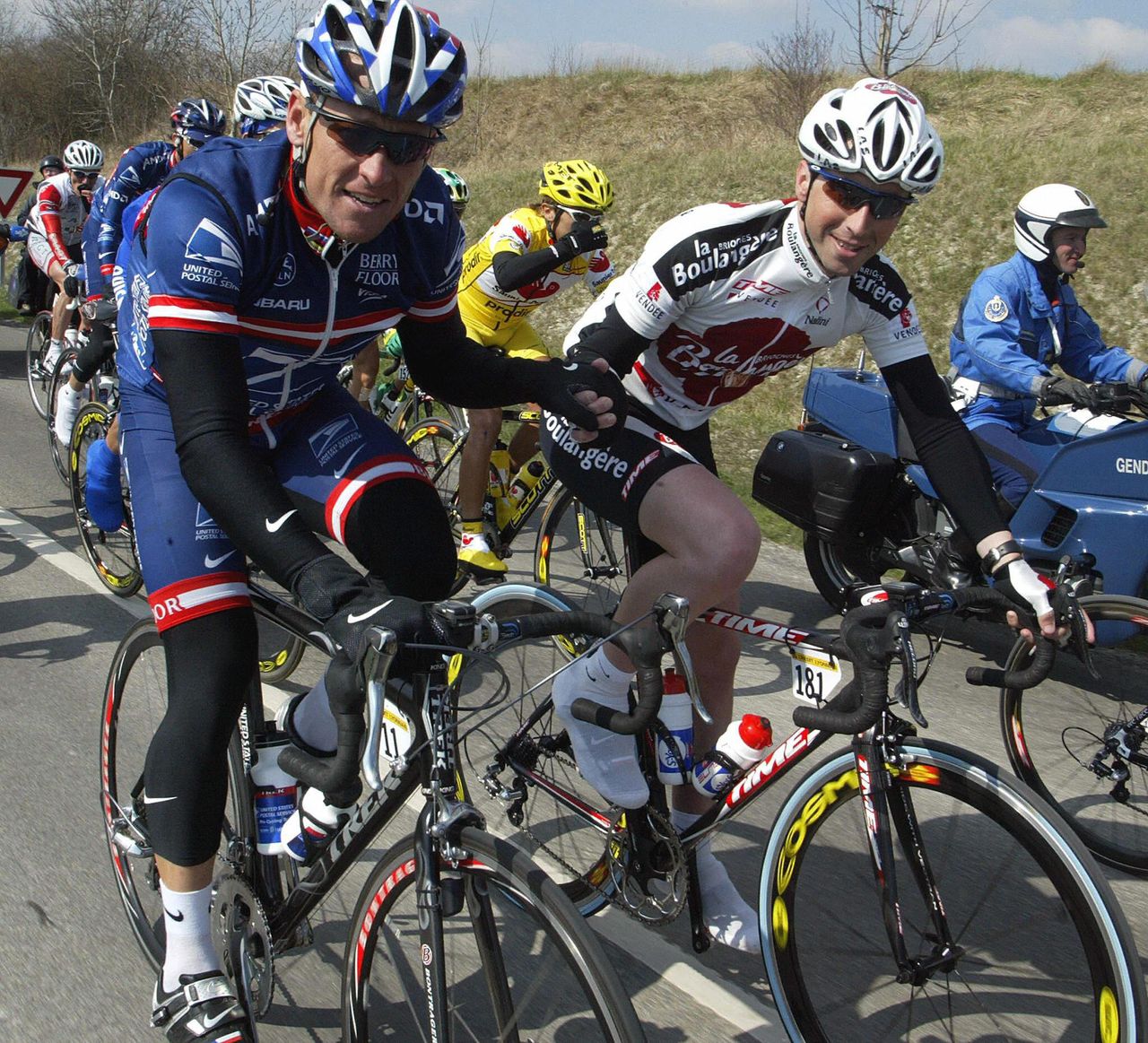 Lance Armstrong welcomes Joseba Beloki back to the peloton at Criterium International in 2004. The Basque was the victim of a serious crash at the previous summer's Tour de France, where he been poised to be Armstrong's biggest rival.
