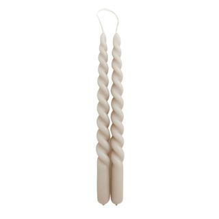 Two spiral candles in beige