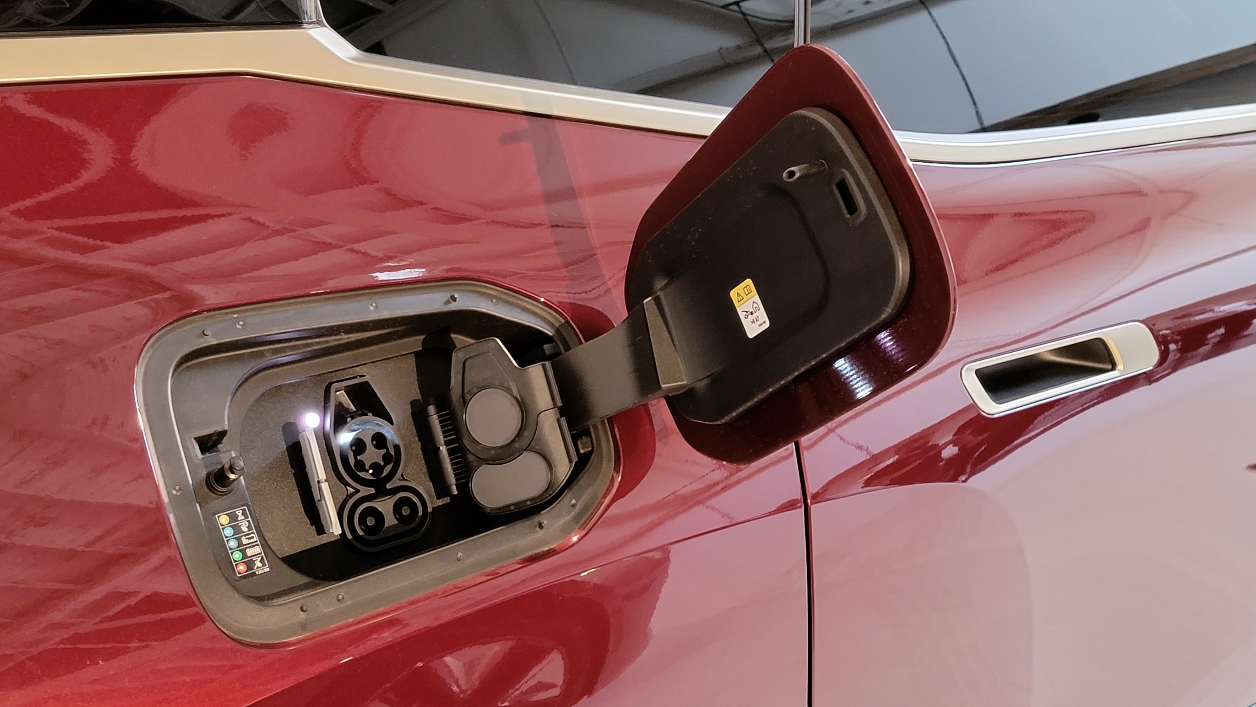 Close-up up of an EV charging port