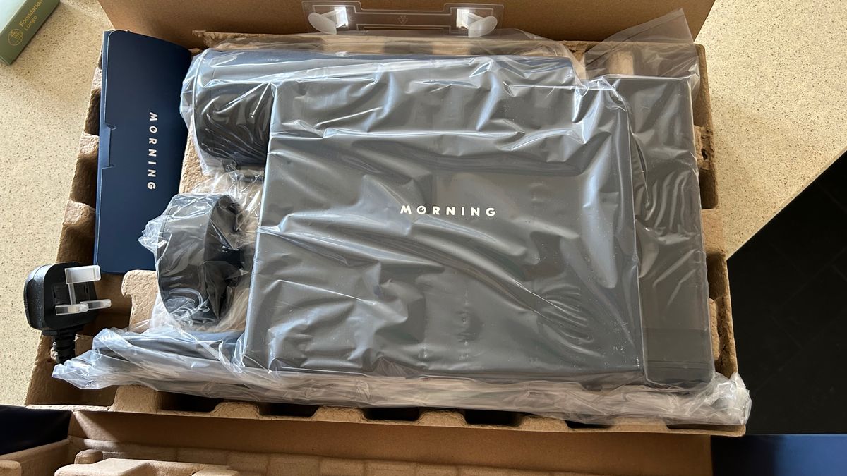 looking inside the box of the morning coffee maker machine