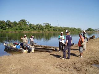 Here the researchers and field guides prepare their boat to one of the lake sites, where they examined sediment cores for ancient pollen grains.