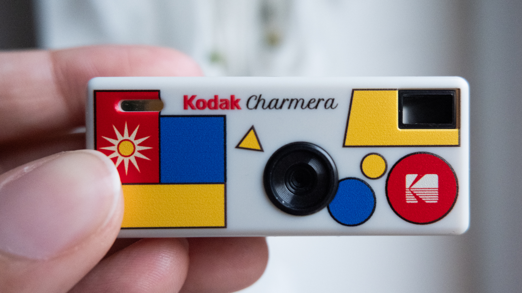 A photo of a Kodak Charmera keychain camera