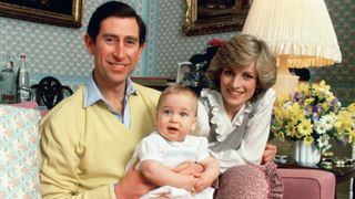 Prince Charles and Princess Diana pose with a baby William