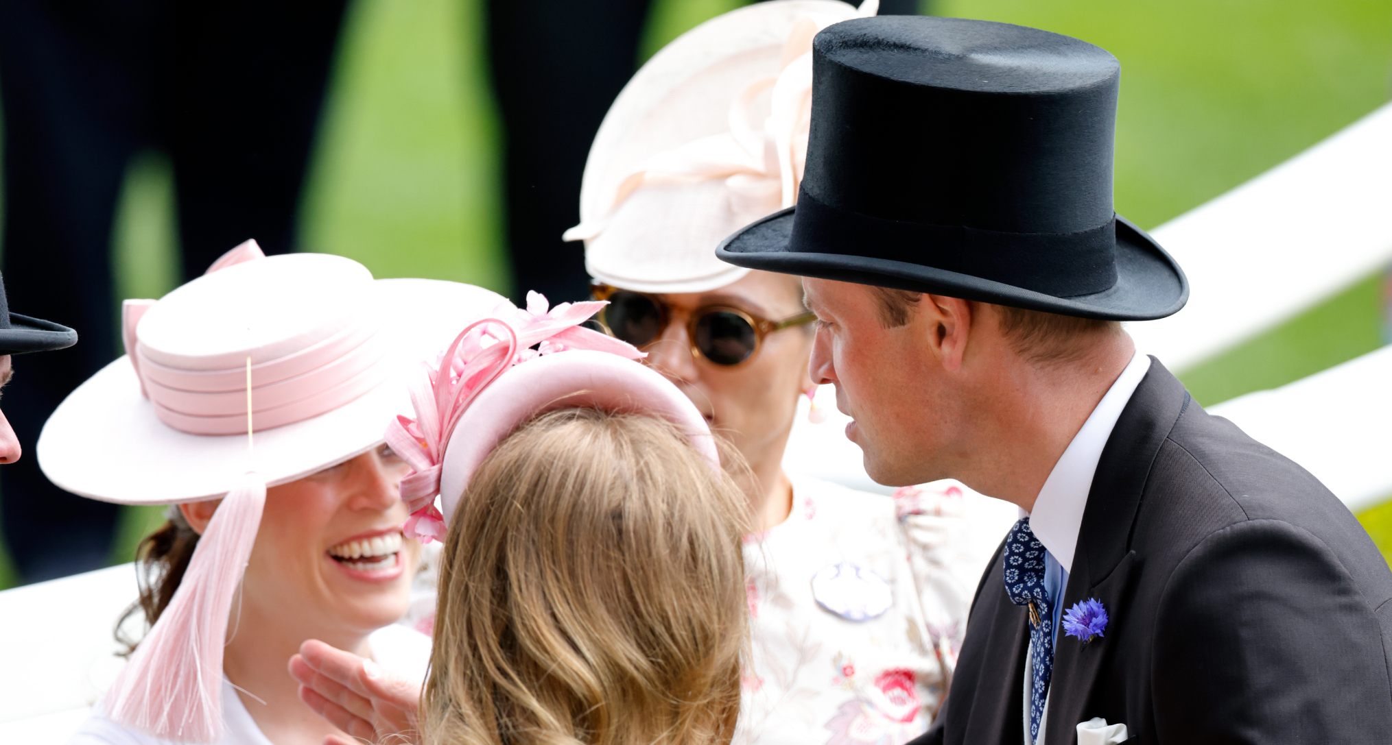 Prince William playing with Princess Eugenie's hat