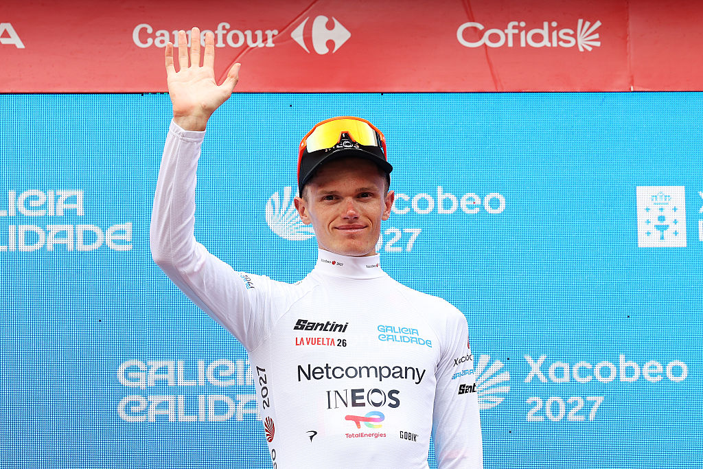 LORCA, SPAIN - SEPTEMBER 02: Oscar Onley of Great Britain and Netcompany INEOS Cycling Team celebrates at podium as White Best Young Rider Jersey winner during the La Vuelta - 81st Tour of Spain 2026, Stage 11 a 153.8km stage from Cartagena to Lorca 342m / #UCIWT / on September 02, 2026 in Lorca, Spain. (Photo by Alexander Hassenstein/Getty Images)