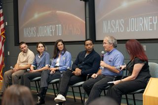 Participating in a discussion at Kennedy Space Center aimed at students were: Michael Johansen, NASA research engineer; Gioia Massa, NASA project scientist; Nicole Stott, a retired NASA astronaut; Chiwetel Ejiofor, an actor who portrays Vincent Kapoor in the movie; Dave Lavery, NASA program executive for Planetary Exploration and Sarah Ramsey of NASA Communications.