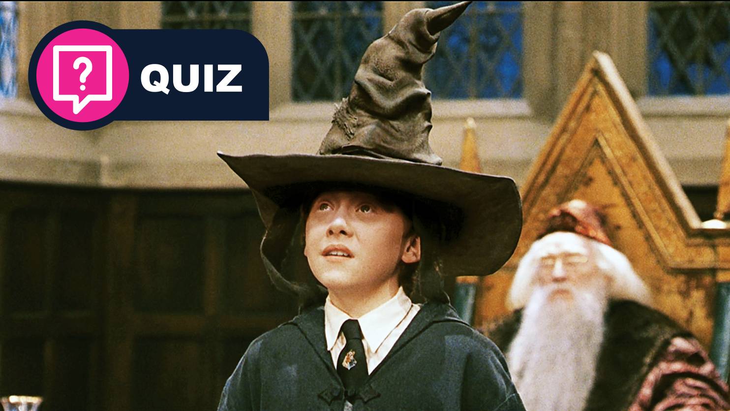 A still from Harry Potter and the Philosopher's Stone, showing Ron Weasley being judged by the Sorting Hat.