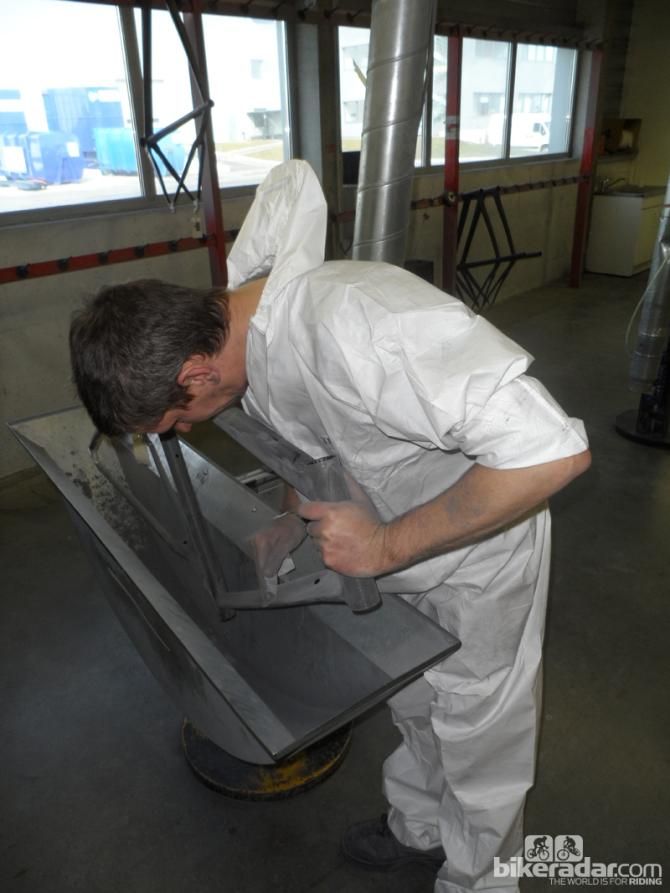 Another round of quality control checks begins. At this stage, every inch of the frame is checked for cosmetic imperfections, and internal examinations and alignment checks are completed
