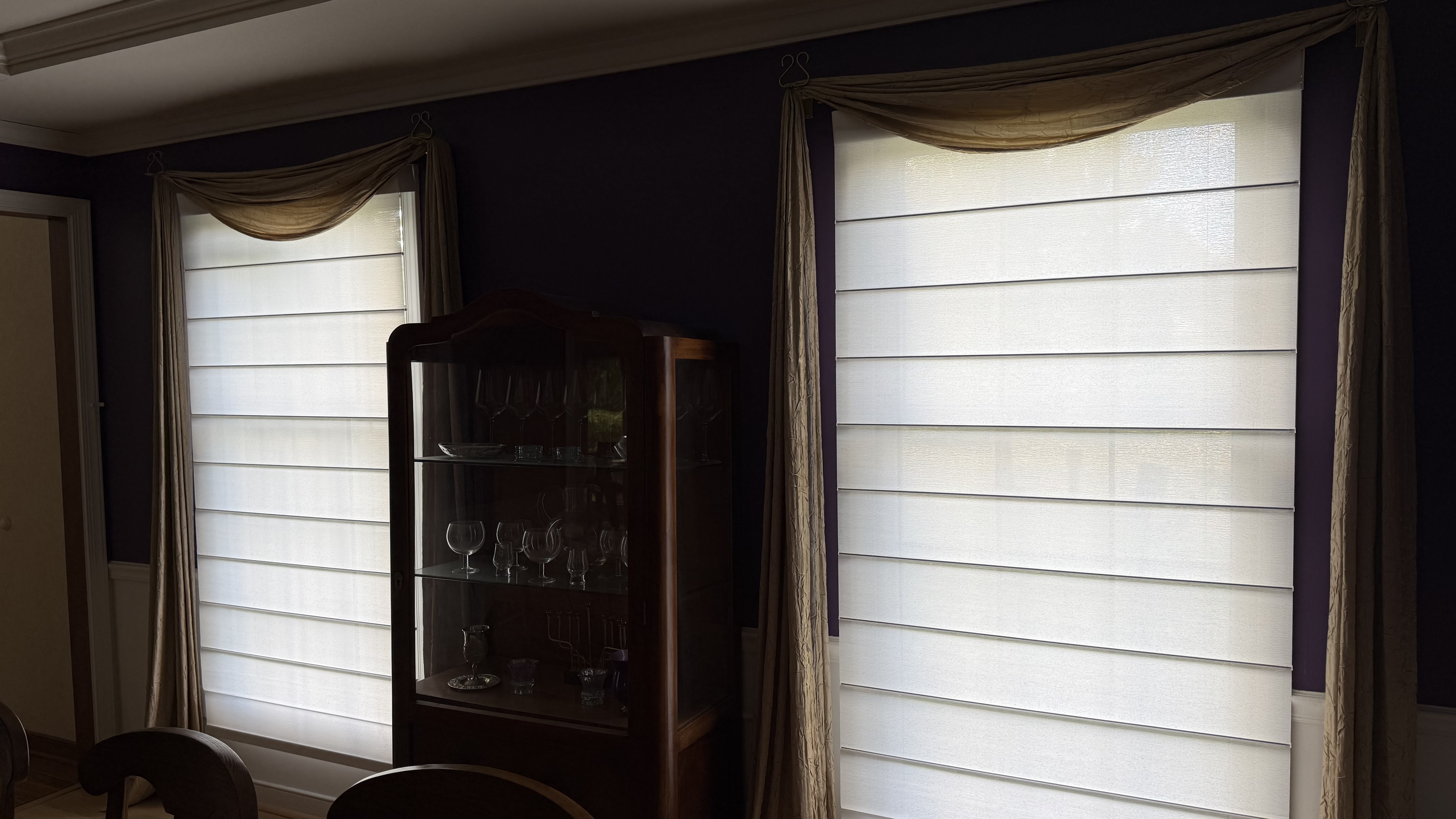 WEFFORT Smart Shades - two of them, closed, with sunlight filtering through