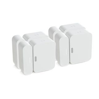 Four pairs of white rectangular door sensors