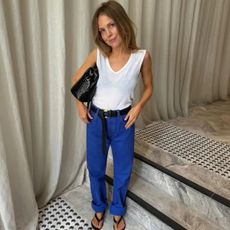 Influencer Rachelle Rowlings wearing a cobalt blue trousers