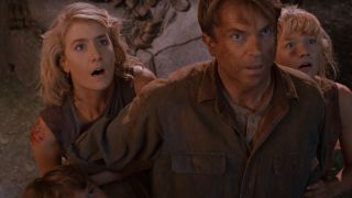 Sam Neill, Laura Dern, and Ariana Richards looking up in awe in the finale to Jurassic Park.