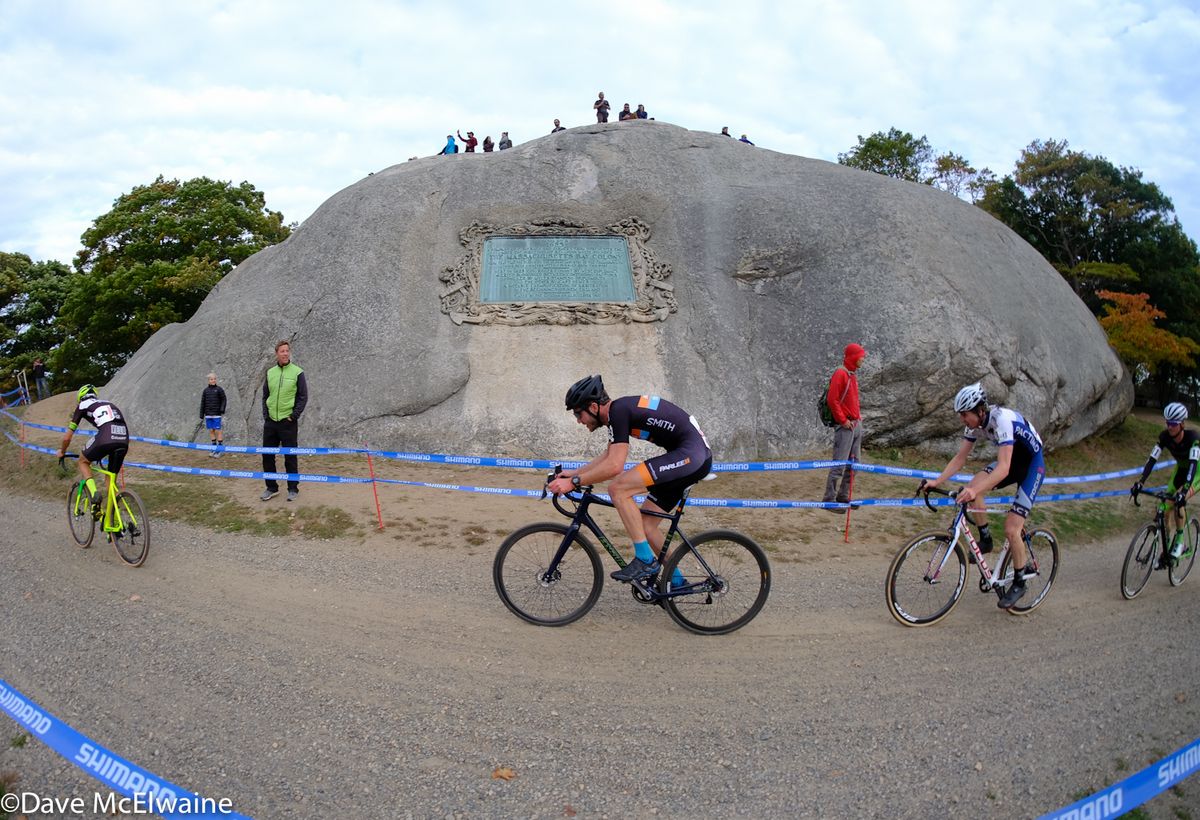 A chase group passes by Tablet Rock halfway through the race