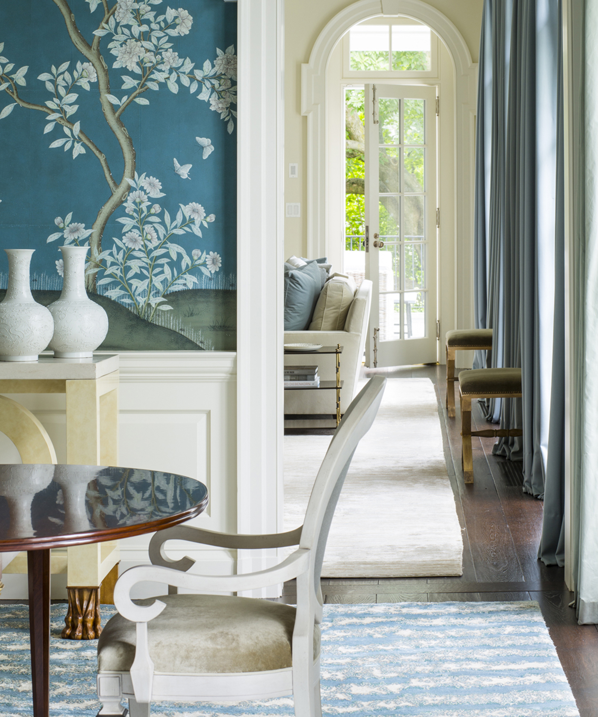 dining room with oversized blue and white rug