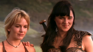 Gabrielle and Xena next to each other in Xena: Warrior Princess