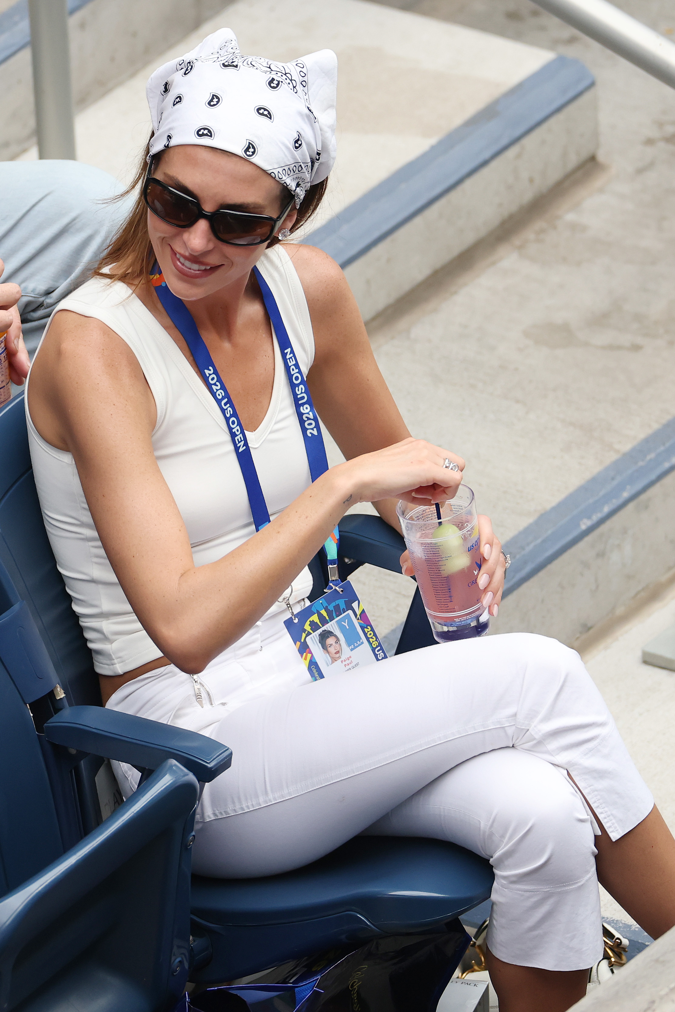 Paige Paul looks on during the Men's Singles First Round match between Tommy Paul and Coleman Wong on Day 1 of the 2026 US Open.