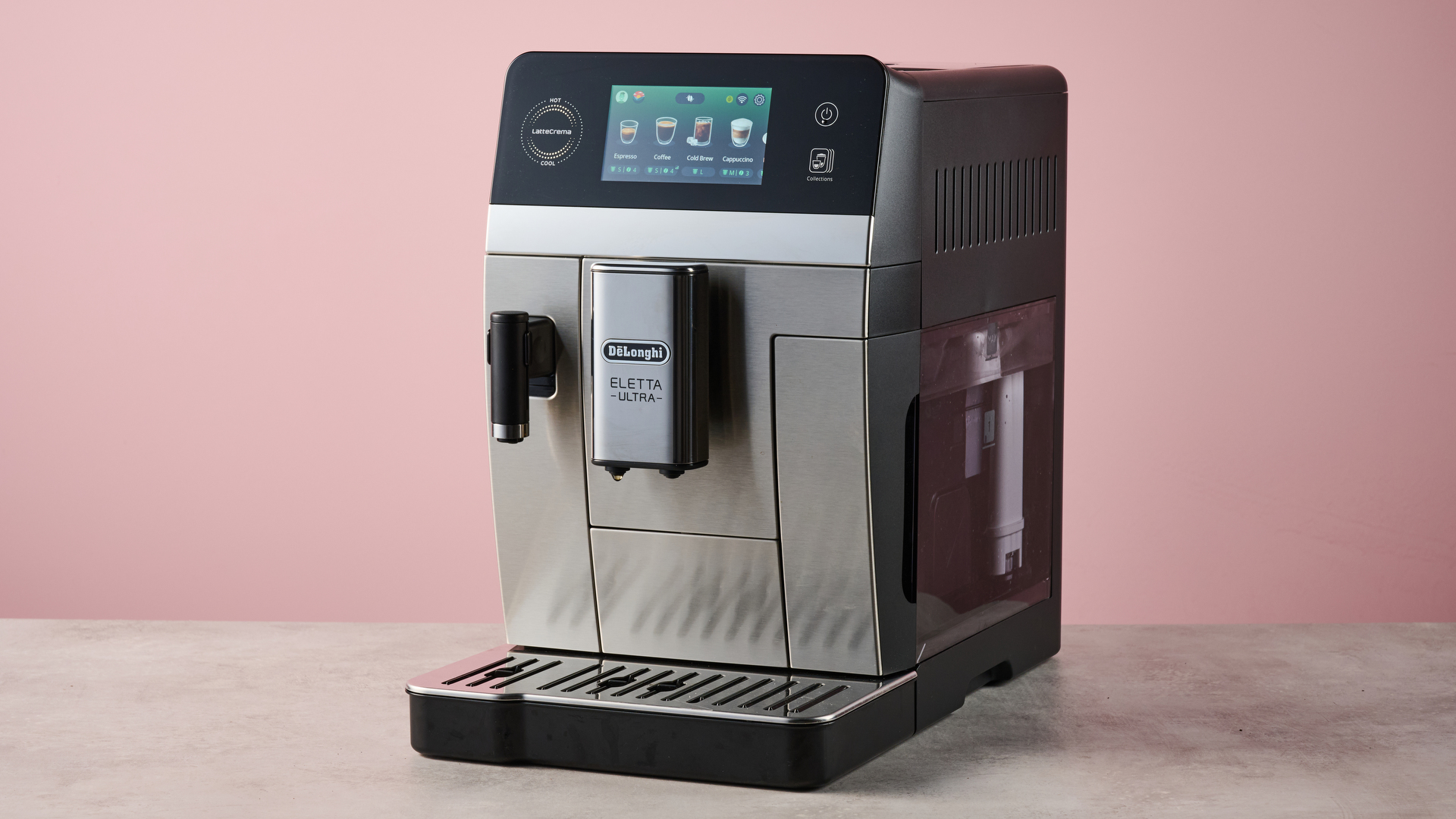 The De'Longhi Eletta Ultra with its menu screen showing in front of a pink background.