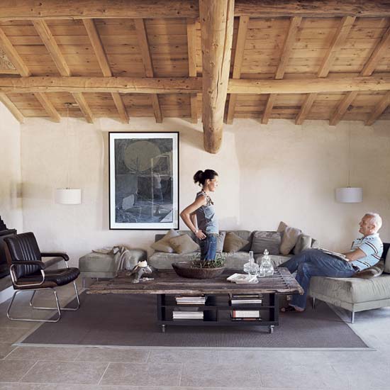 living room with sofa and cushions
