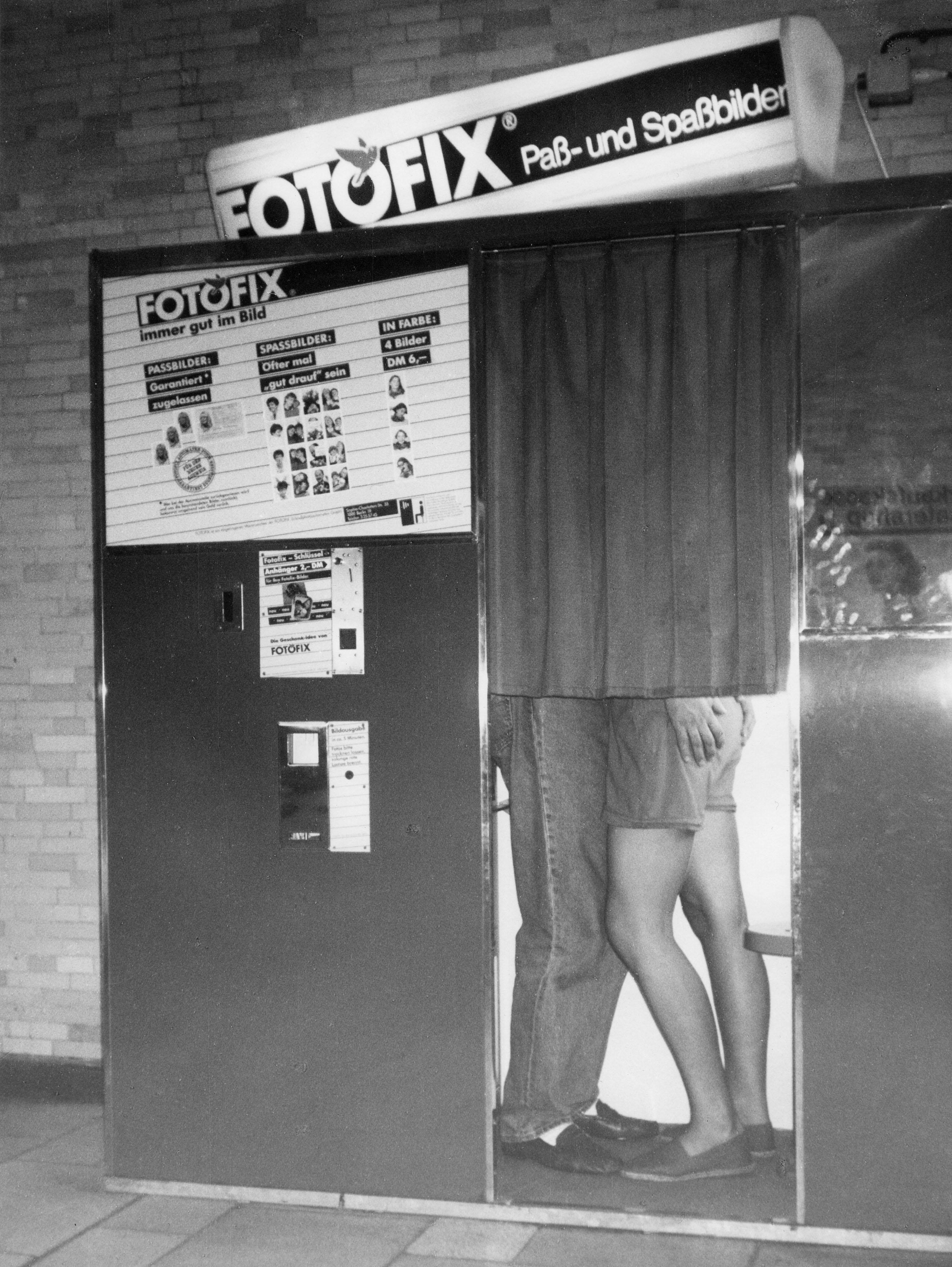 Flirting in a photo booth in the 1980s, in East Germany