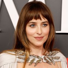 Dakota Johnson at the 2026 Time100 Gala at Jazz at Lincoln Center with a micro fringe hairstyle