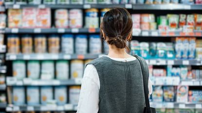 Woman shops in supermarket