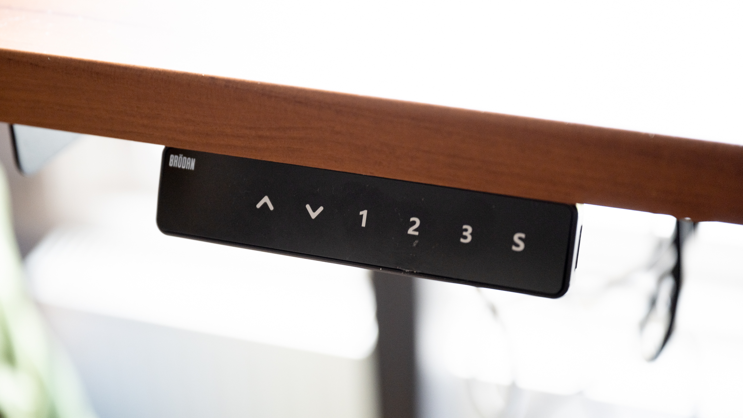 A close-up photo of the Brodan L-shaped standing desk