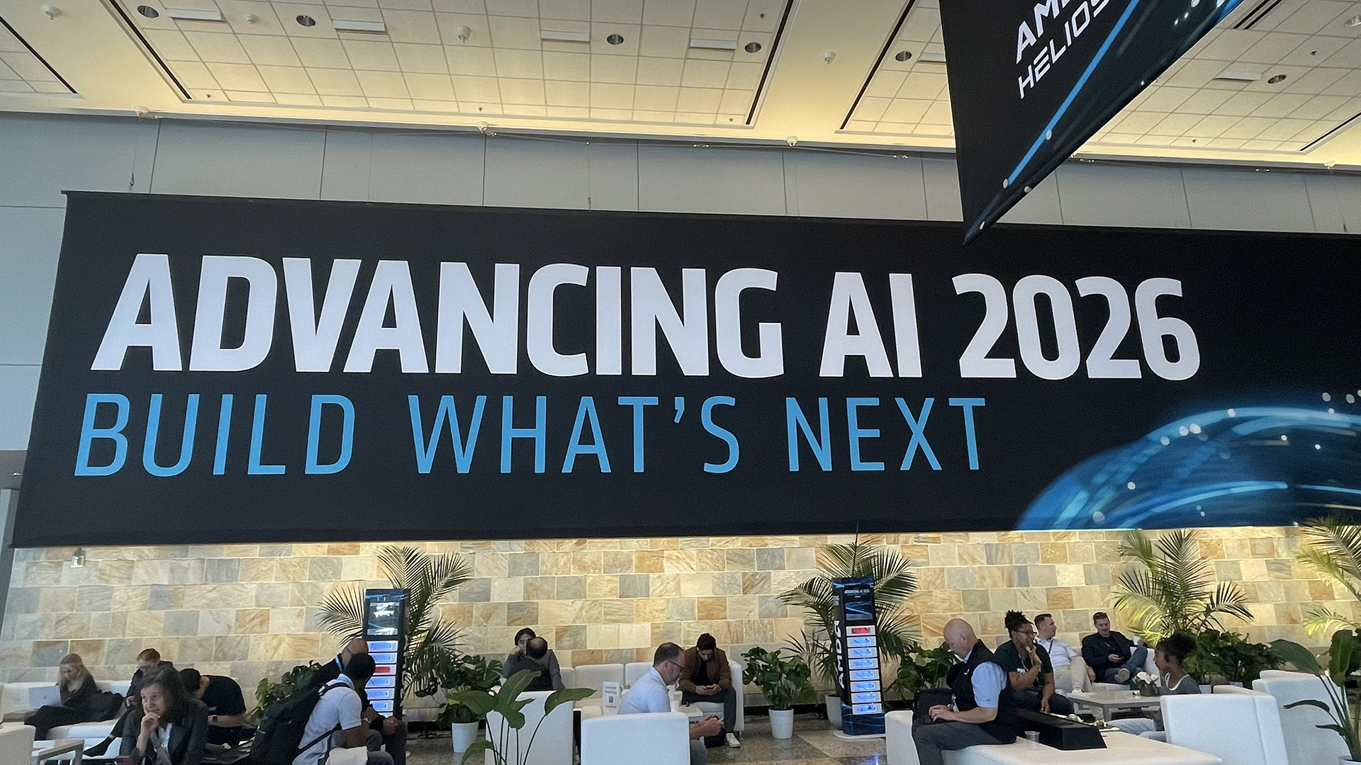 A banner at AMD Advancing AI 2026 that says Advancing AI 2026 Build What's Next
