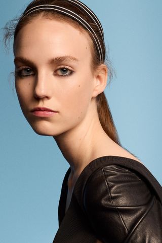 Model at Dior wearing lived-in liner, a key Spring/Summer 2025 fashion month beauty look