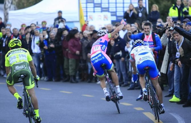 Filippo Pozzato (Lampre-Merida) celebrates his sprint victory over Francesco Reda and Mauro Santambrogio.