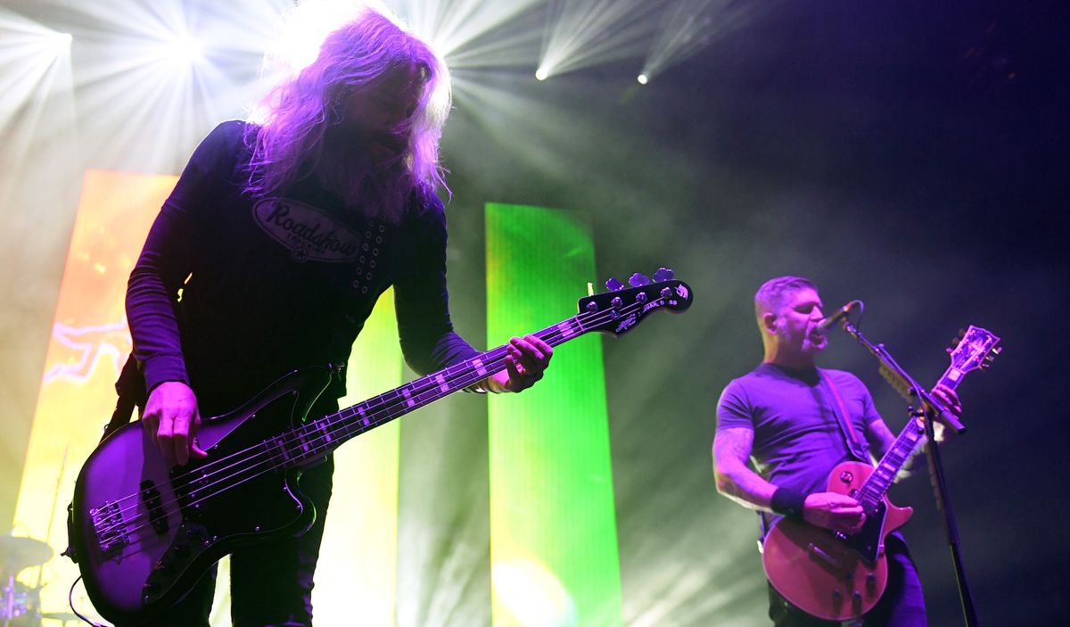 Troy Sanders (left) and Bill Kelliher perform live with Mastodon