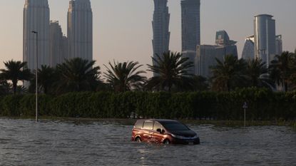Car caught in flood in Dubai.