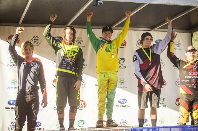Elite men's downhill podium