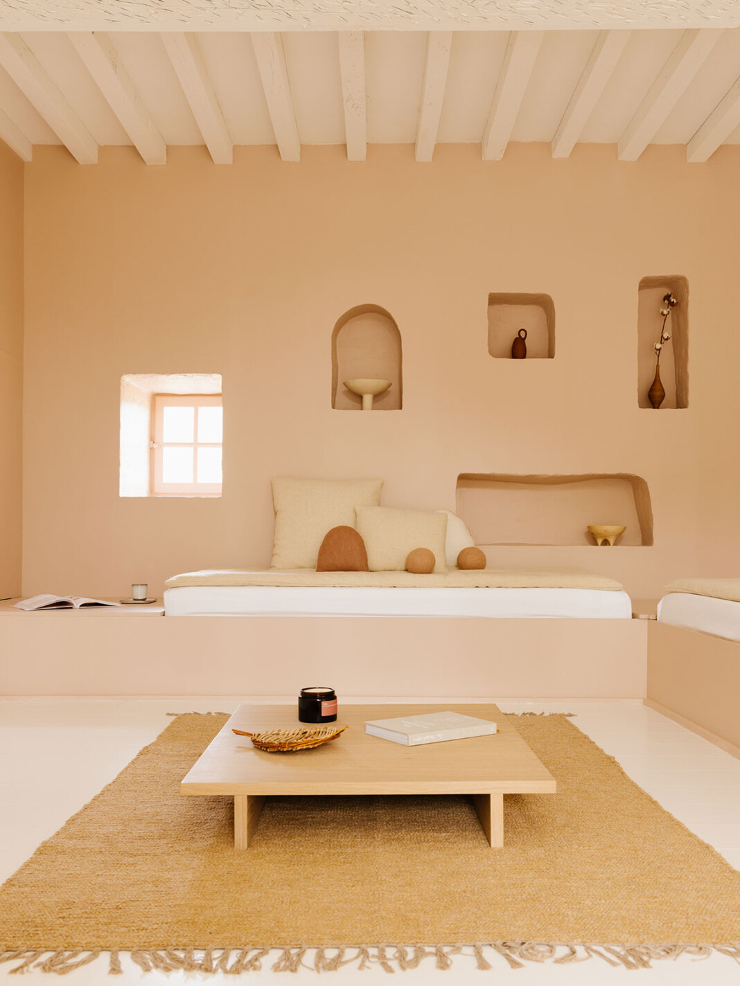 A whimsically decorated guesthouse pairs imaginative, color-blocky interiors with soft lines and palettes with a leafy, nature-immersed exterior.