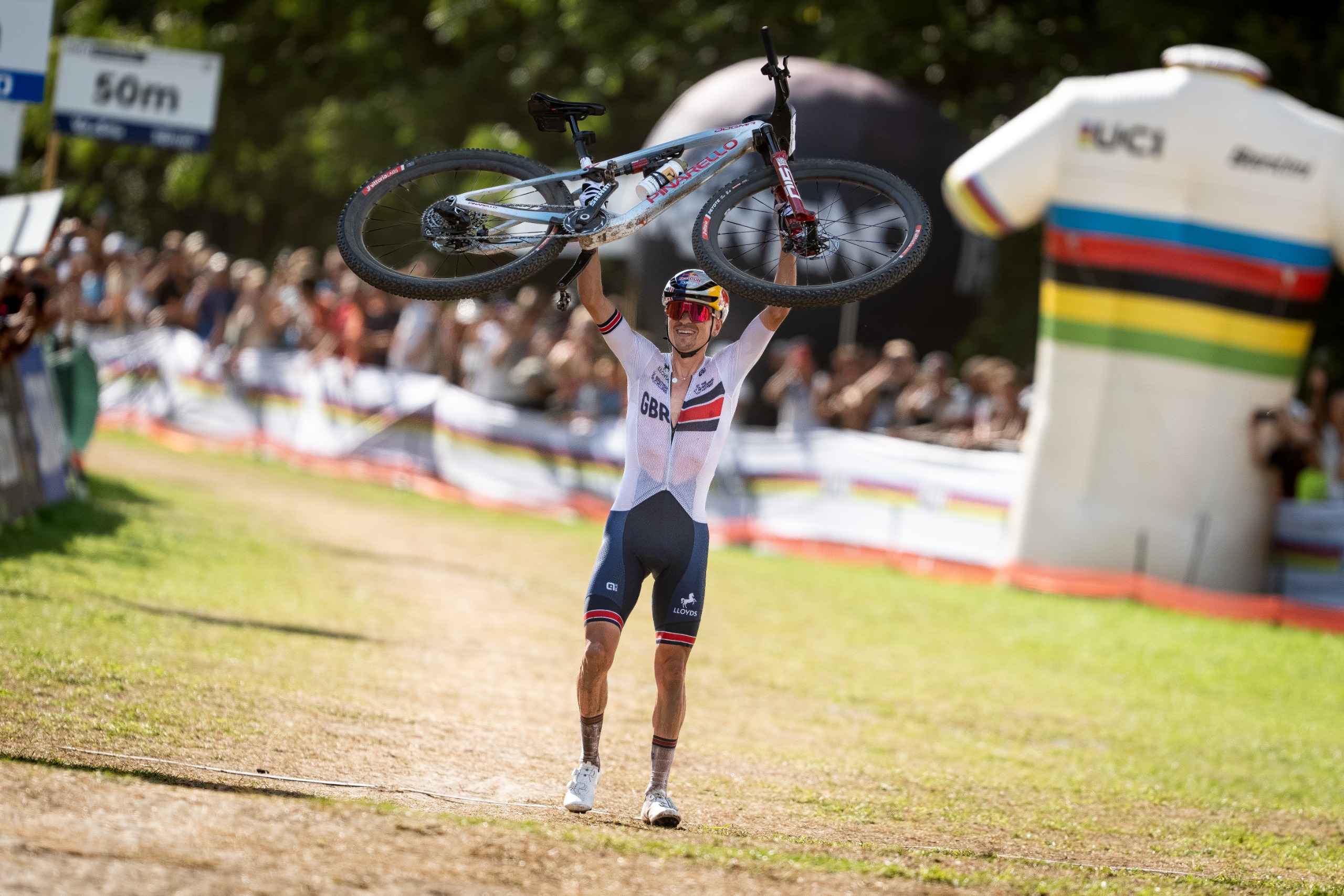 Tom Pidcock celebrates