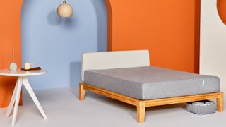Best king size mattress image shows the grey Siena Memory Foam Mattress in an orange bedroom