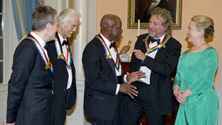 John Paul Jones, Jimmy Page, Buddy Guy and Robert Plant alongside US Secretary of State Hillary Clinton in Washington for the Kennedy Center Honors