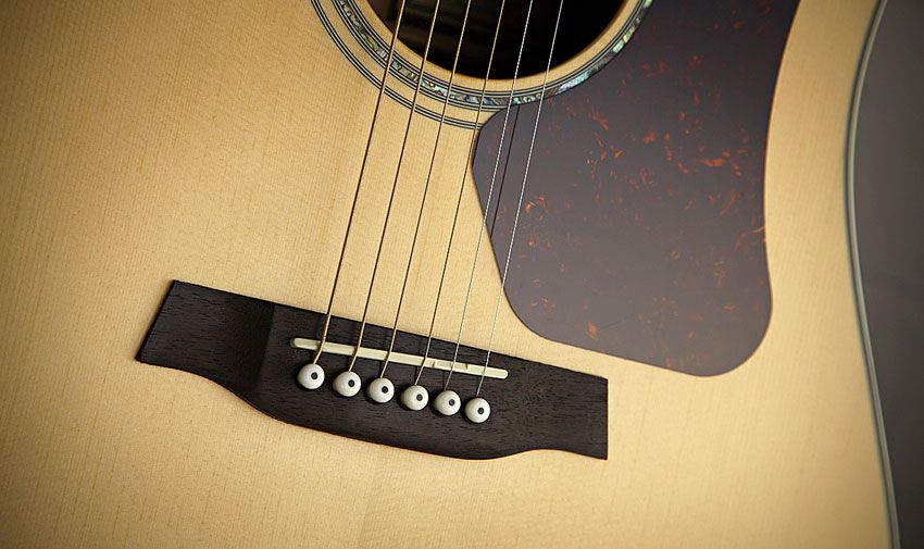The compensated bridge saddles are made from Fossalite