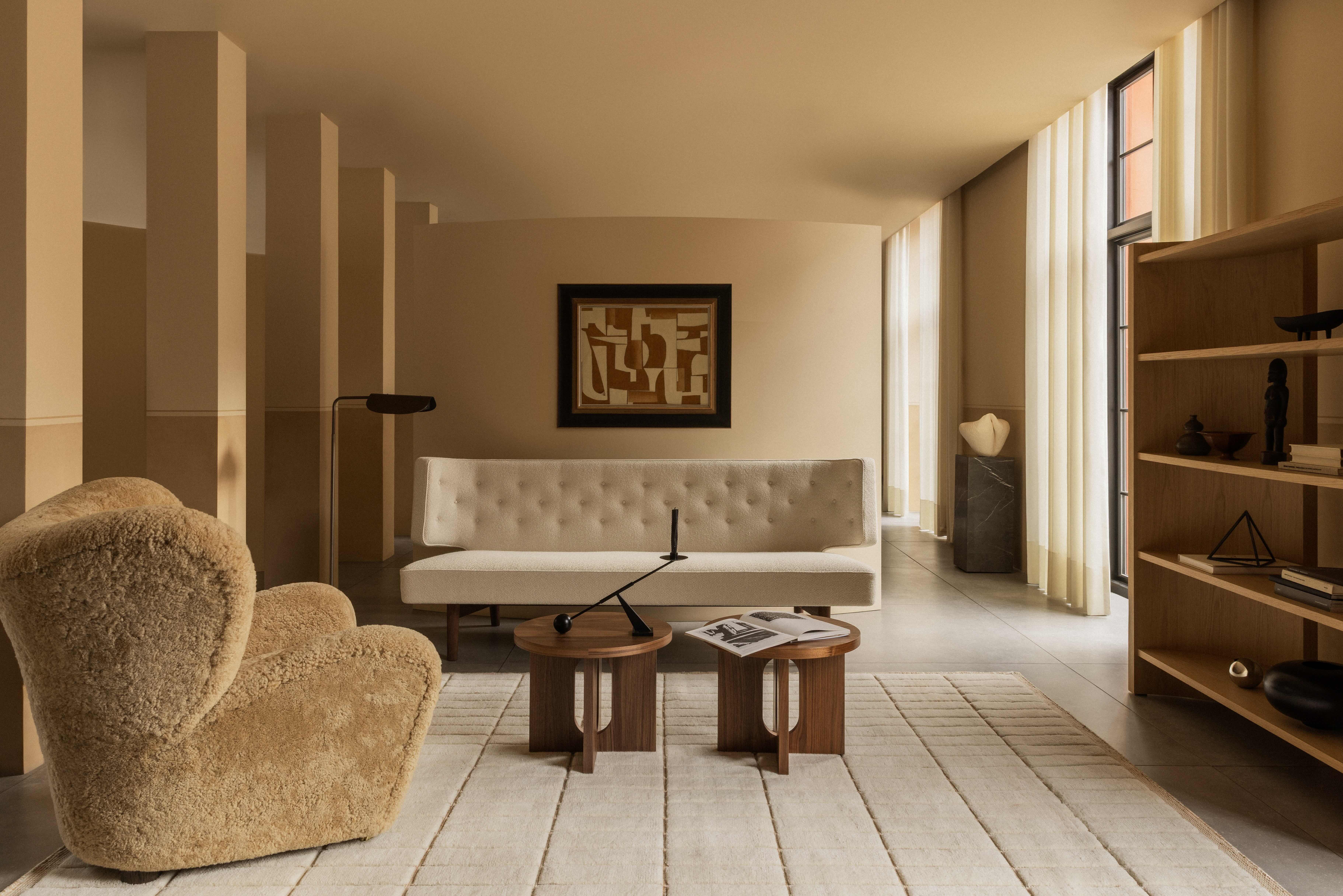 freestanding shelving unit in oak in a neutral interior