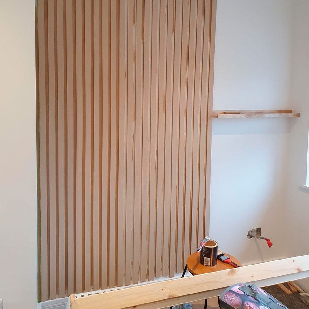 Homeowner creates stunning wood panelling feature wall on a budget ...