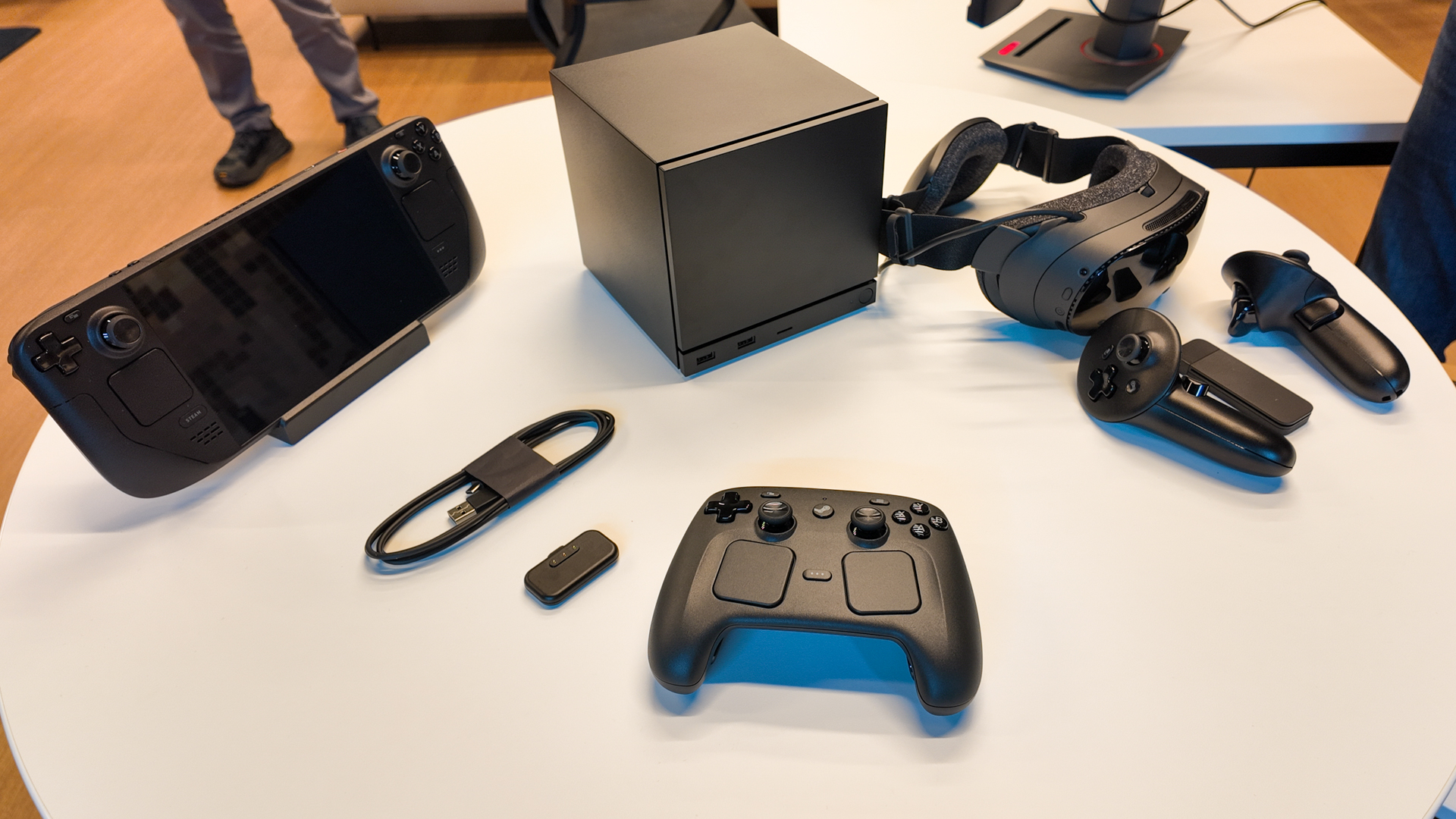 The Steam Deck alongside Valve&#039;s three new products: the Steam Machine, Steam Frame, and Steam Controller.