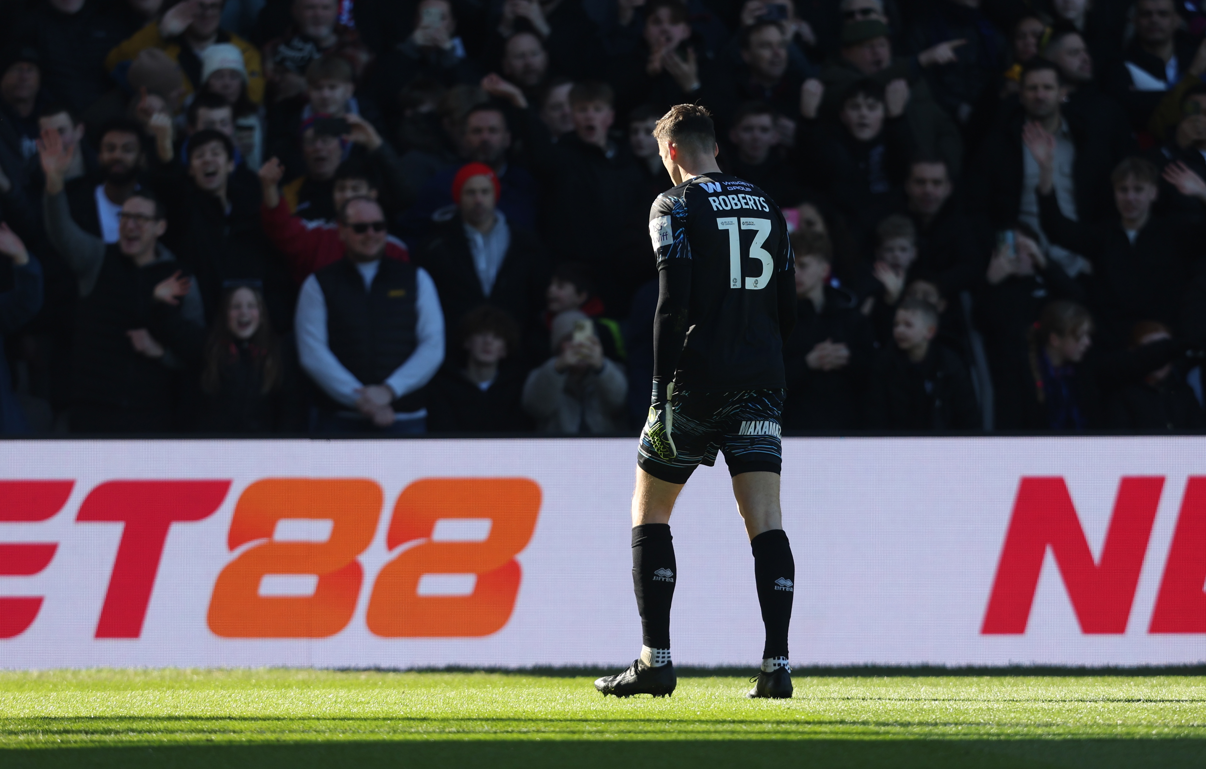 Millwall goalkeeper Liam Roberts was sent off for his challenge on Jean-Philippe Mateta