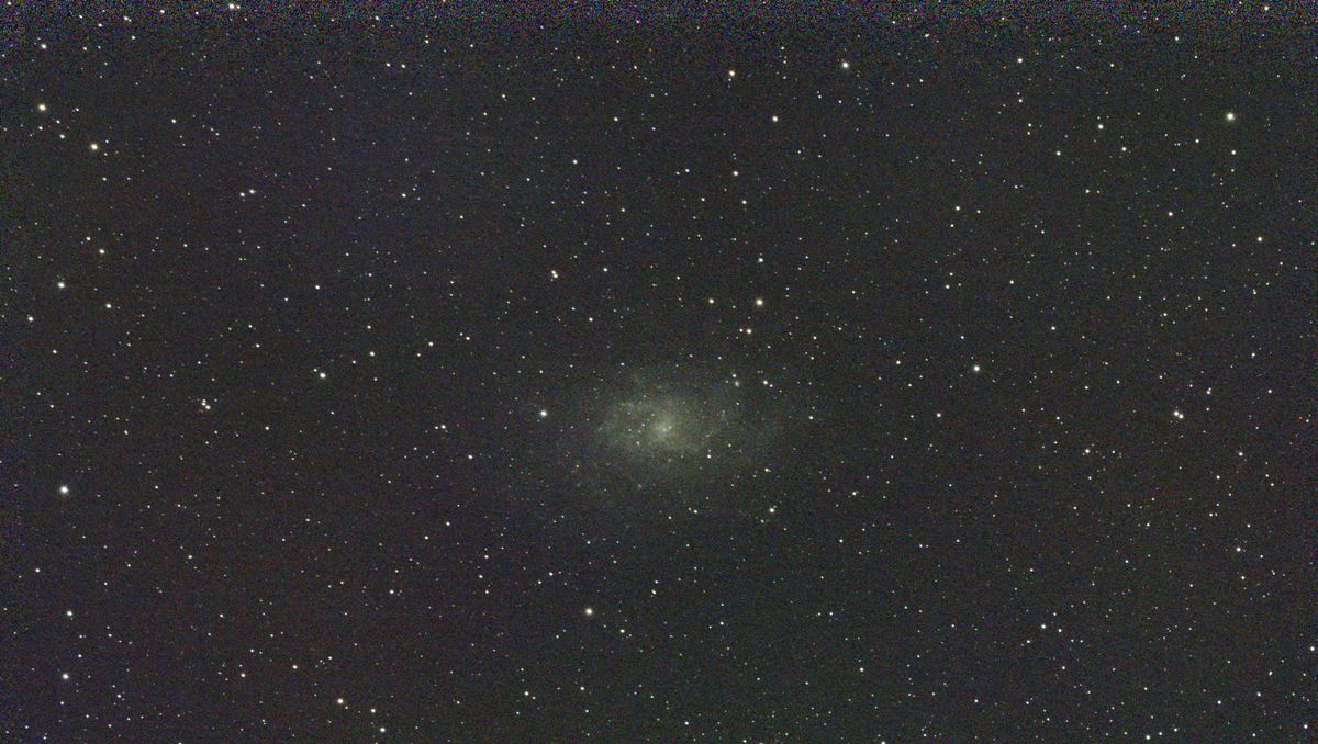 A photograph of the M33 galaxy in Triangulum taken with the Dwarf III smart telescope, unprocessed
