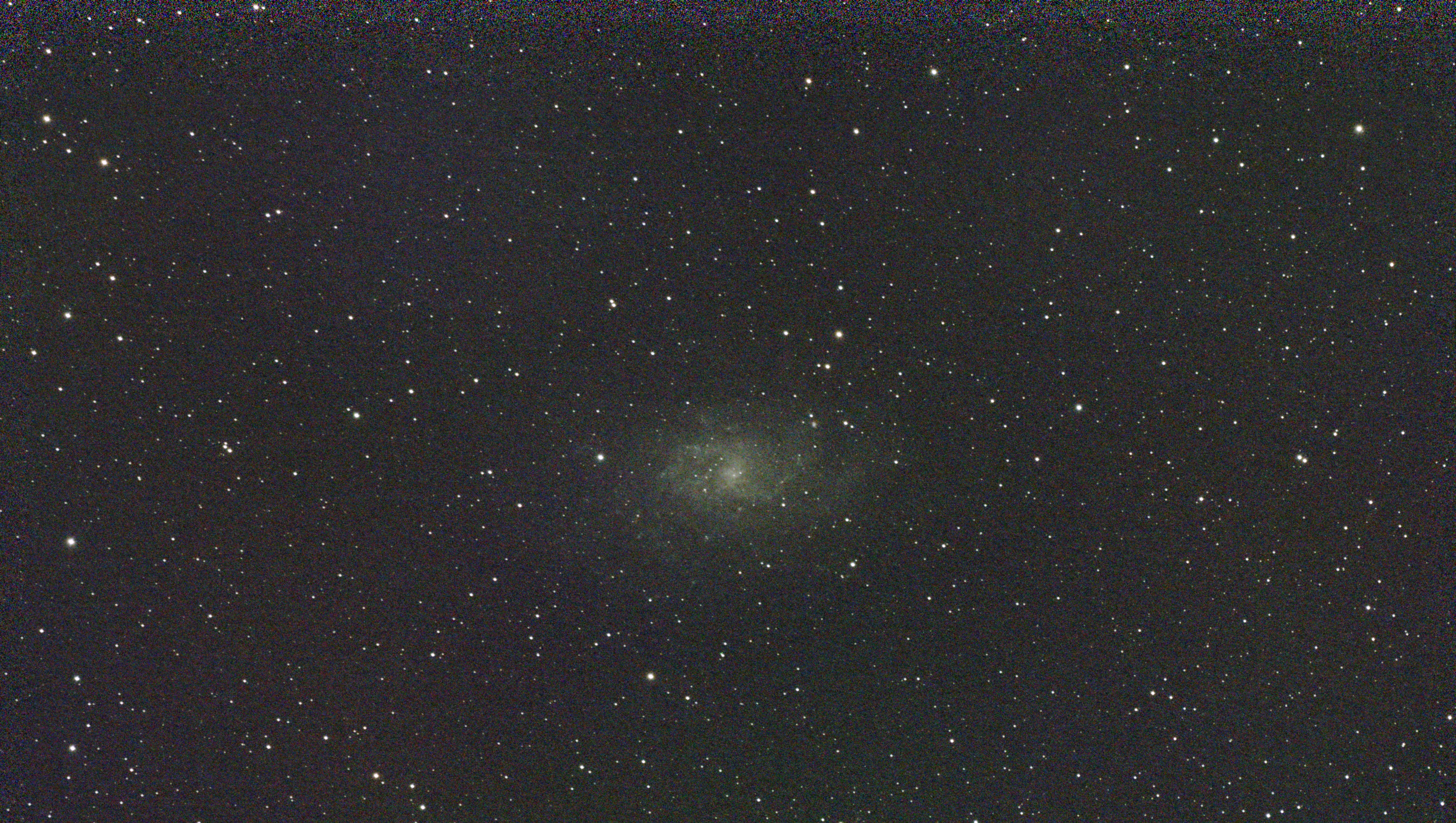 A photograph of the M33 galaxy in Triangulum taken with the Dwarf III smart telescope, unprocessed